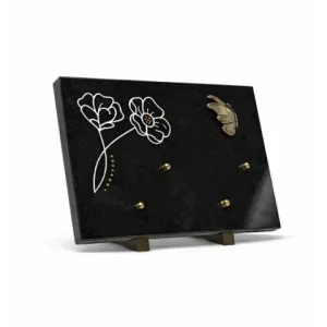 Plaque granit noir motif fleur bronze papillon